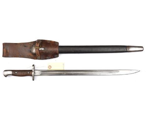 A P1907 bayonet, various stamps at forte including maker's name Wilkinson and date 10 '15, in its steel mounted leather scabb