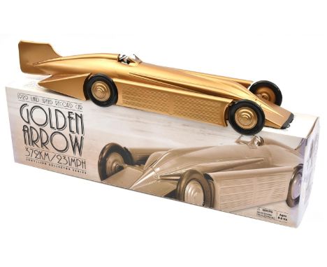 A Schylling Golden Arrow 1929 land speed record car. A tinplate clockwork example from the Schylling Collector Series. A limi