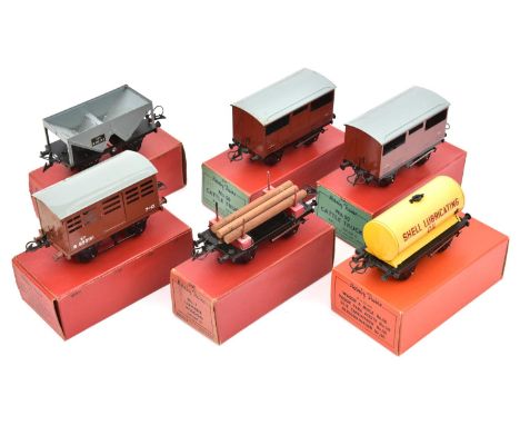 6x Hornby O Gauge freight wagons. 2x No.50 Cattle Trucks. A No.1 Cattle Truck. A No.50 Shell Tank Wagon. A No.1 Lumber Wagon.