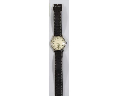 KM marked Berg wristwatch. Serial 683907. Plated case, brushed finish, some wear and marks to plating from case opening, 35mm