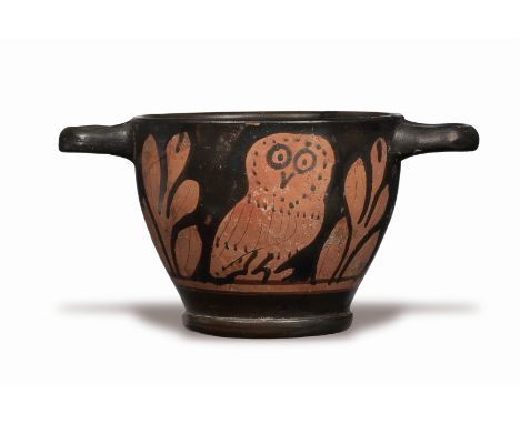  A Greek red-figure owl skyphos South Italy, circa 4th Century B.C.Decorated on each side with an owl with large circle and d