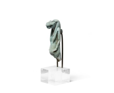  An Egyptian turquoise glazed composition amulet of Taweret Late Period, circa 664-332 B.C.The half-length figure of the hipp