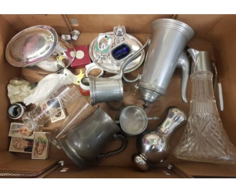 A mixed collection of items to include a claret jug, pewter tea service items, silver plated cruet set, silver plated tea cad