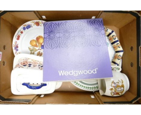 A mixed collection of items to include Wedgwood calendar plate, cheese dome, Royal Worcester Evesham dinner plates, etc (1 tr