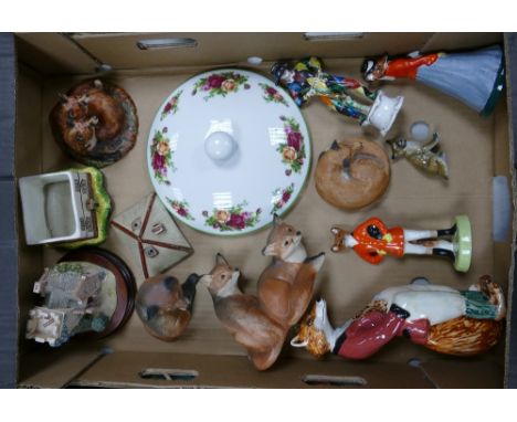 A  mixed collection of items to include Anysley foxes, ceramic huntsman fox, Lilliput Lane lodge, etc 