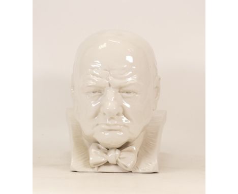 A Ceramic Bust of Winston Churchill. Some chips and cracks. Height: 23cm 