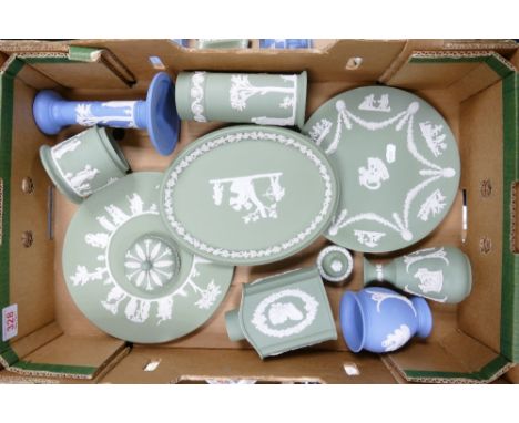 A collection of Wedgwood Jasperware to include tea caddy, vases, candlestick, dressing table tray, plates, etc (1 tray) 