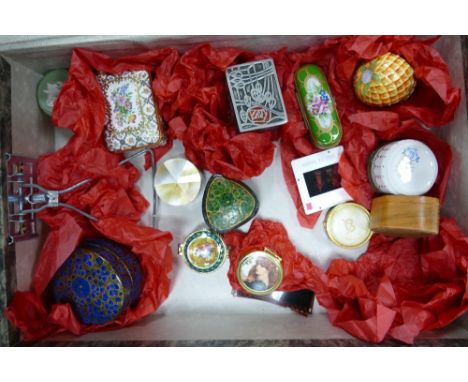 A collection of small enamel, pottery &amp; paper mache lidded boxes 