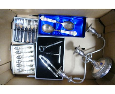 A mixed collection of metalware items to include spoons, Wedgwood nutcracker and bottle opener set, Anysley salad serving set