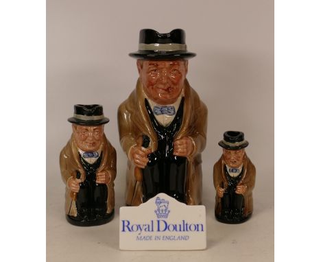 Set of three Sir Winston Churchill graduated Royal Doulton toby jugs together with a ceramic display stand (4) 
