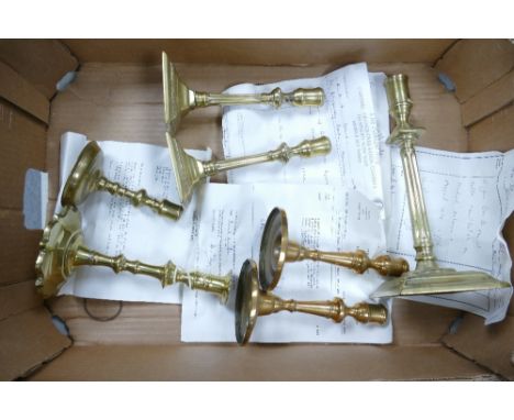 2 pairs of candlestick holders together with 3 individual candlestick holders some with bill of purchase &amp; sold as 18th c