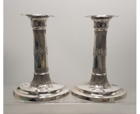 Pair of Sterling silver weighted candle stick holders, Sheffield 1901, total weight 729.5g. 