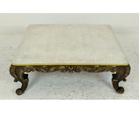 STOOL, 19th century Italian painted and carved giltwood, rectangular cream upholstery, 43cm H x 102cm x 73cm. 