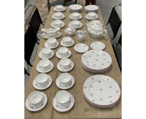 PART DINNER AND TEA SERVICE, Richard Ginori, with rose springs and impressed patterned edge with shaped pink trim, comprising