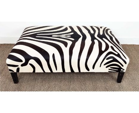 HEARTH STOOL, rectangular zebra skin on ebonised legs, 40cm H x 120cm x 76cm. 