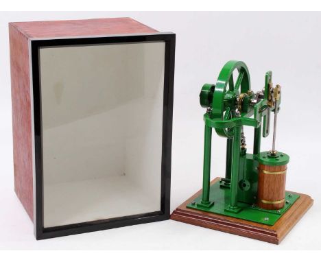 A very well-engineered possibly kit built model of a stationary vertical steam engine, comprising of single vertical cylinder