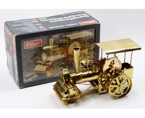 A Wilesco model No. D367/D36 brass  steam powered traction engine, housed in the original polystyrene packed box, appears as 