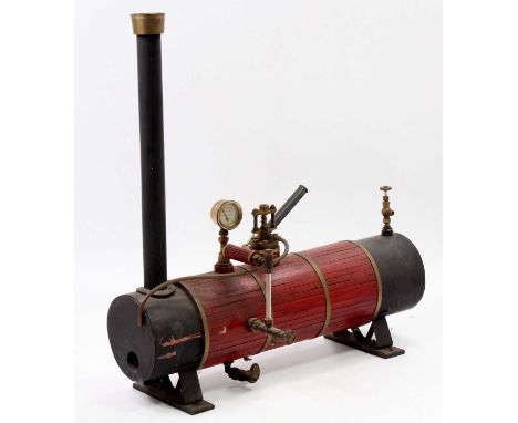 A scratchbuilt stationary steam engine boiler comprising of wooden clad and brassbound body, measures 43cm length x 46cm heig
