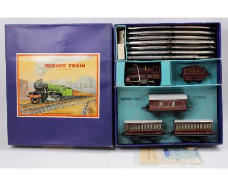 1948-54 Hornby 0-gauge clockwork No.501 LMS Passenger set comprising red 0-4-0 loco &amp; tender LMS 5600 with two 1st/3rd co