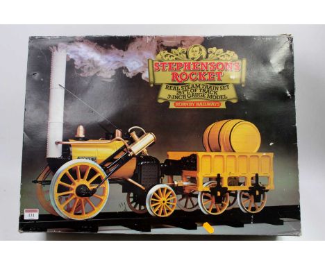 A Hornby 3.5" gauge Stephenson's Rocket live steam locomotive and tender gift set, comprising of locomotive, tender and a qua