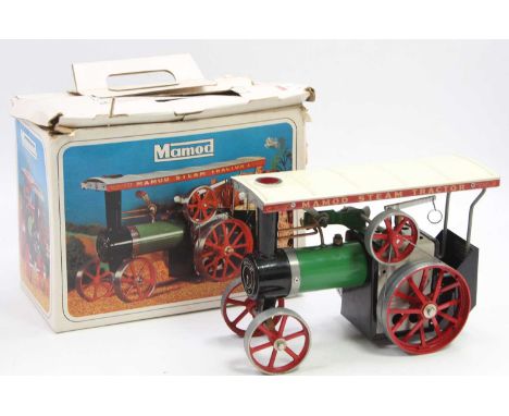 A Mamod TE1A traction engine of usual specification housed in a heavily worn card box, model has had some use