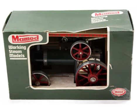 A Mamod TE1A live steam traction engine housed in the early issue green ground window display box, model has some use but ver