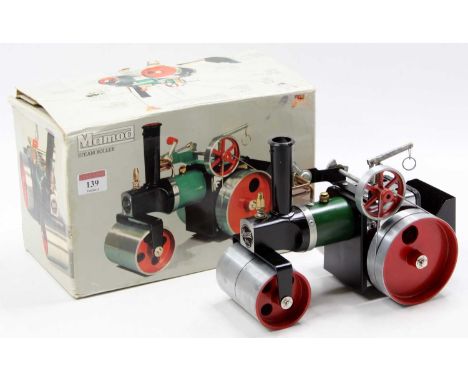 Mamod steam roller SR1A green body, white roof, red hubs, boxedModel is in excellent condition.  Little, if any, use.No scorc