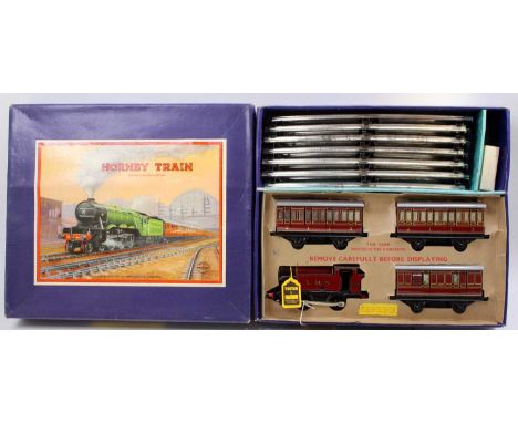 1947-54 Hornby 0-gauge clockwork No.101 LMS passenger set comprising red 0-4-0 tank loco LMS no.2270 with two No.1 LMS 1st/3r