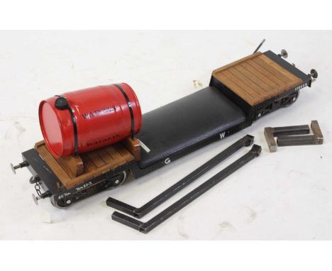 A 5" gauge riding trolley based on  a Great Western Railway 40 ton low wagon complete with Watneys scratch built water tank, 