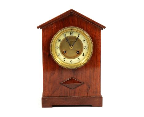 A mahogany cased mantel clock, J A Haskell, Ipswich, ivorine chapter ring, French movement striking on a gong, 29cm.Condition