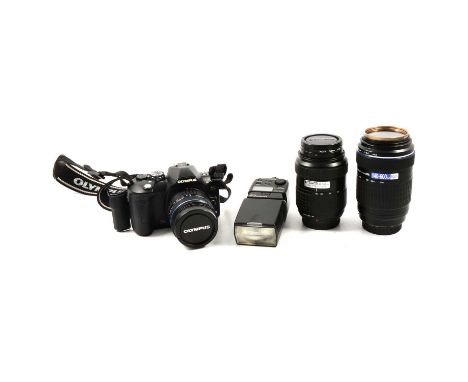 Olympus E510 SLR digital camera, with 40-150mm lens, 140-600mm lens, a bag and accessories.