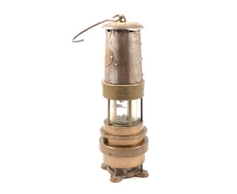 A Naylor Spiralarm Type "M" miner's lamp, 30cm, and another in process of restoration, a ring binder of research on miners la