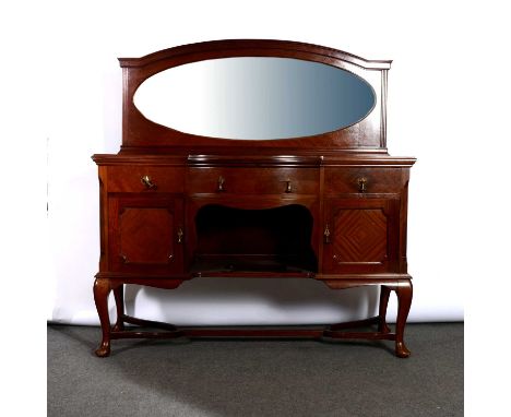 Victorian mahogany mirror-backed sideboar, the back with oval bevelled glass, the bowfront base with three drawers, two cupbo