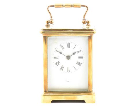 Small French brass cased carriage clock, rectangular enamelled dial, timepiece movement, 12cm.