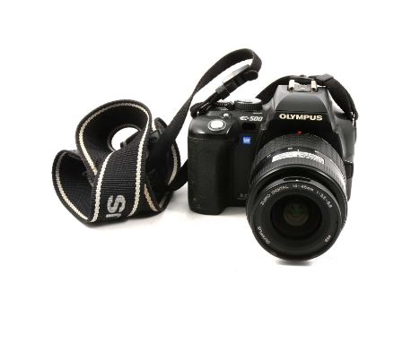 Olympus E500 digital camera, with 14-45mm 1:3.5-5.6 lens, with carry case and accessories.