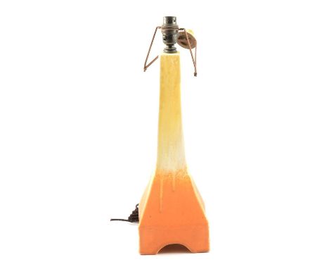 A Ruskin Pottery lamp base, square section tapering column, yellow crystalline glaze to top over matt orange glaze, moulded a