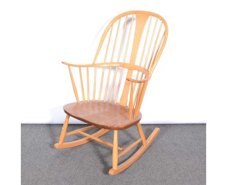 An Ercol light beech and elm rocking chair, two other Ercol chairs; and a footstool.Qty: 4Condition report:The frames are all