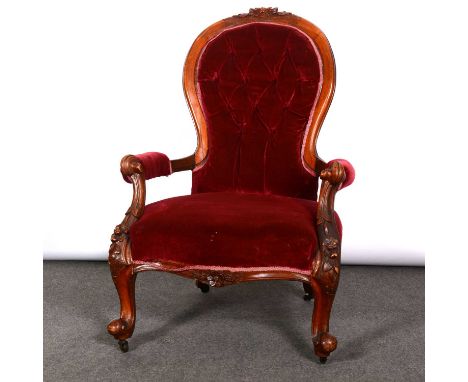 Victorian walnut easy chair, carved and scrolled frame, cabriole legs on castors, button dralon upholstery, width 70cm, heigh