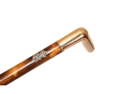 A FINE DIAMOND-SET AND GOLD-MOUNTED GENTLEMAN'S RATTAN WALKING STICK, EARLY 20th CENTURY, with gold crop handle, the shaft ap