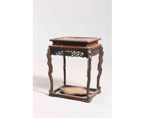 A CHINESE CARVED STAND, LATE 19TH CENTURY, with fretwork carving and lozenge shaped shelf stretcher. 52cm high