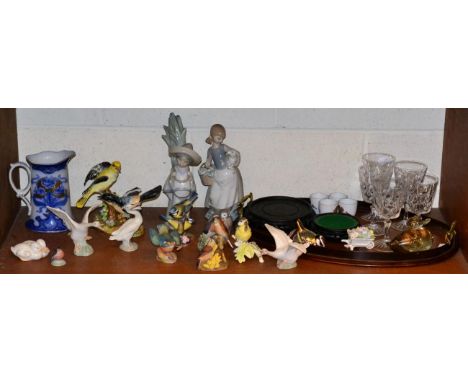 Two Lladro figures; further Lladro swans; a group of Royal Copenhagen birds; Worcester and other bird groups; an oval mahogan