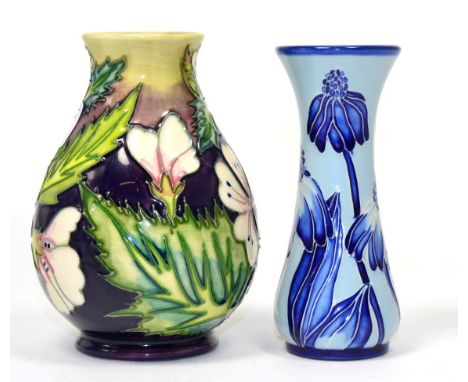 A modern Moorcroft vase, impressed factory marks, 14cm (boxed) and a modern Moorcroft Daisy pattern vase, impressed factory m