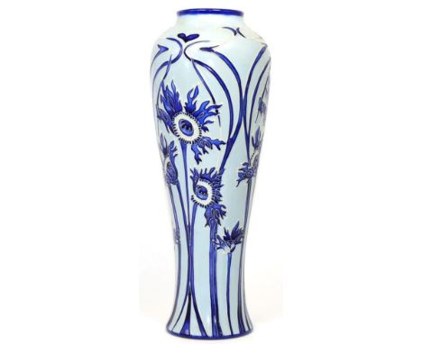 A modern Moorcroft Ragged Poppy pattern vase, designed by Nicola Slaney, impressed factory marks, 37cm (boxed)