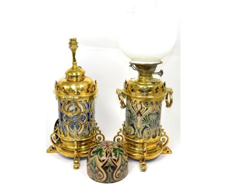 A Doulton Lambeth Stoneware Oil Lamp, with incised decoration, with brass mounts, 43.5cm (converted); and Another (2)