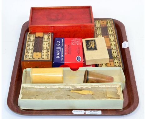 A 19th century ivory box of counters; a quantity of Chinese ''window pane'' mother-of-pearl gaming counters; a chess set; two