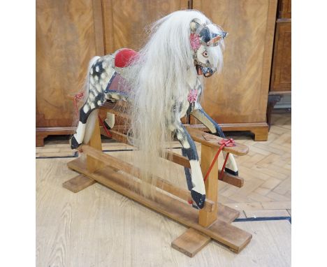 A vintage traditional rocking horse, 118 cm