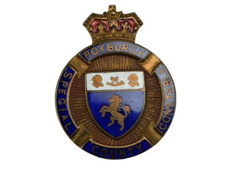 A Roxburgh County Special Constable enamelled lapel badge, impressed 405 