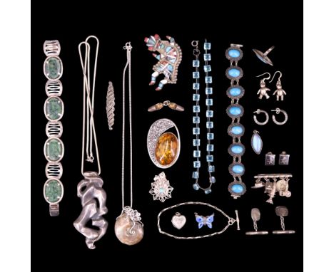 A group of African, Chinese and Mexican / South American white metal / silver jewellery including a heavy abstract cast white