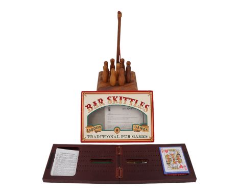 A hardwood cribbage set together with a handmade wooden Bar Skittles game, longest 22 cm