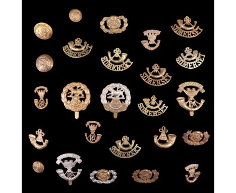 A group of Prince Albert's Somerset Light Infantry and Hampshire Regiment cap and collar badges etc